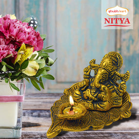 Shubhkart Nitya Ganesha on Paan Leaf With Diya- 138 g